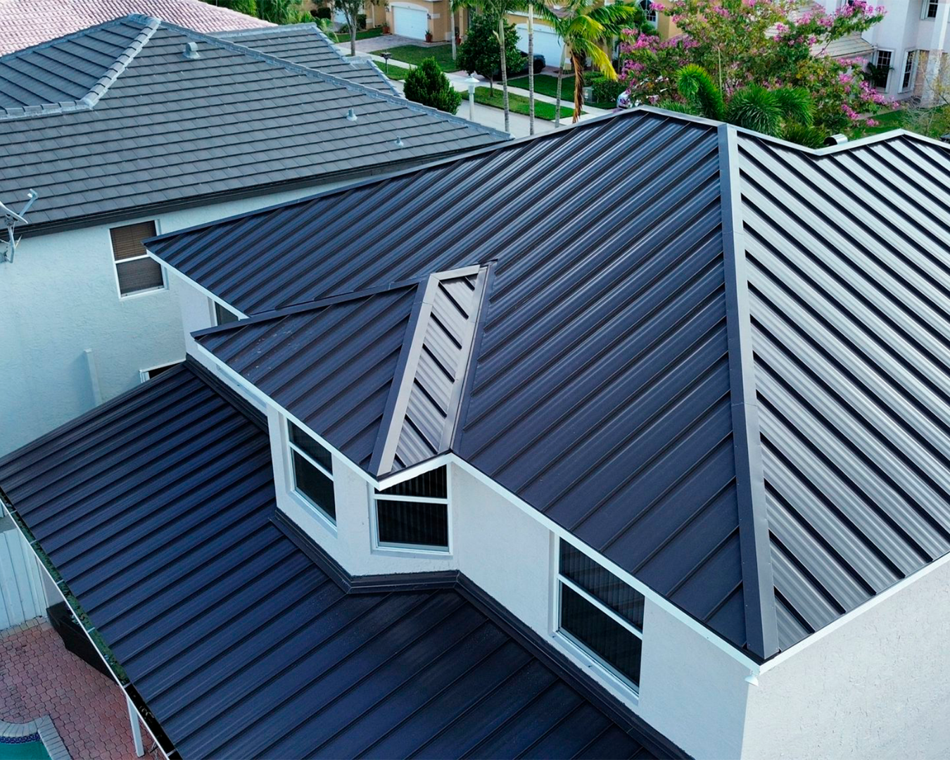 Roofing contractor inspecting storm damage on a residential roof in Florida