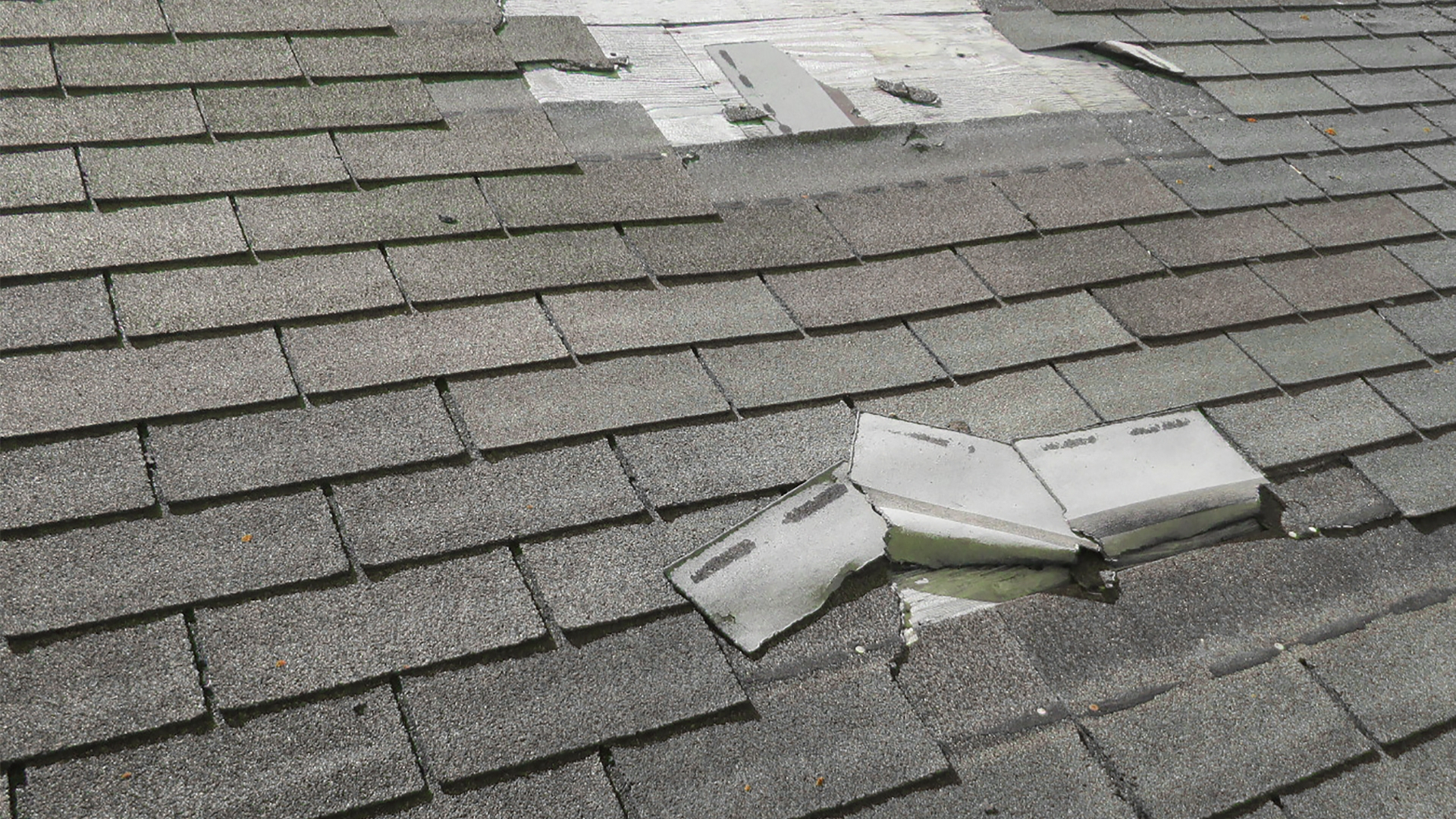 Storm damage roof repair inspection after severe weather in Florida